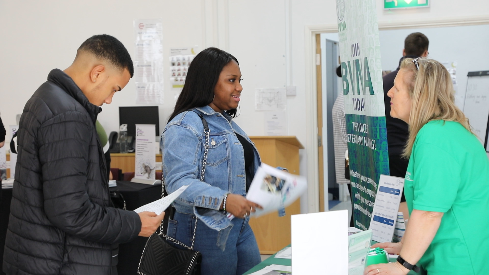 Visitors at Careers With Animals Day speaking to an exhibitor